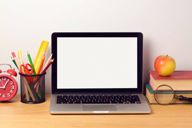 istock Back to school background with laptop computer and books. Modern workplace concept 824907402