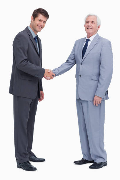 istock Side view of businessmen shaking hands 824907538