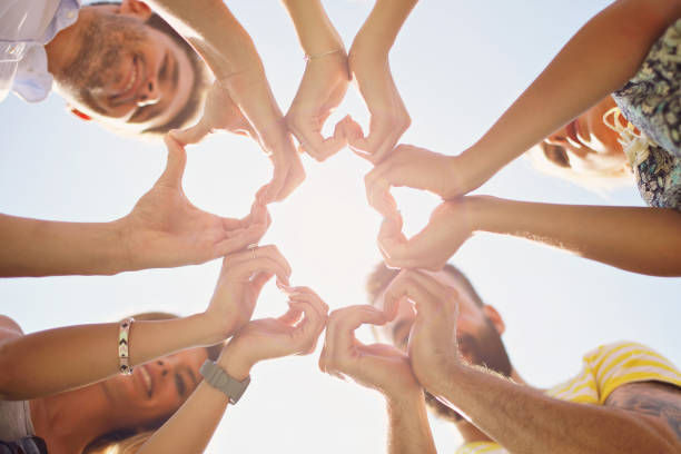 istock Friends group having fun together on grass 824910140