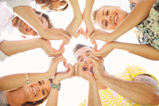 istock Friends group having fun together on grass 824910288