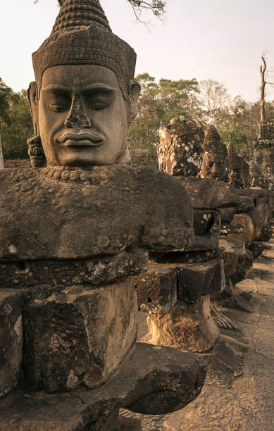 istock A bridge with large statues leading to Angkor Thom Temple 824914034
