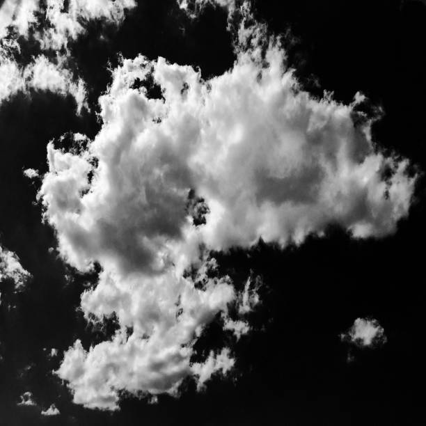 istock Isolated white clouds on black sky. Set of isolated clouds over black background. Design elements. White isolated clouds. Cutout extracted clouds. Black Background. 824924906