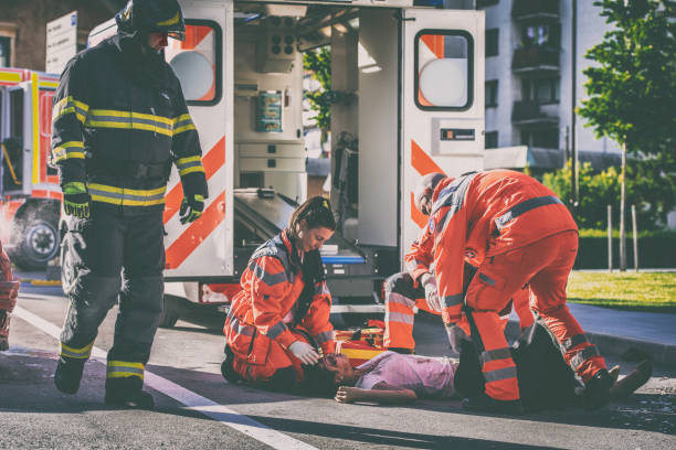 istock Paramedics with car accident victim 824935734