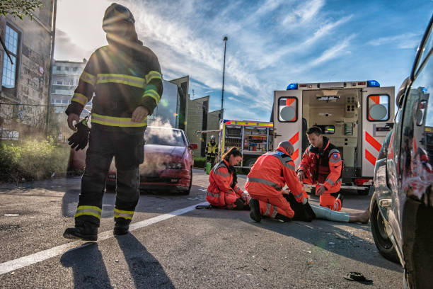 istock Rescue team with car accident victim 824939032