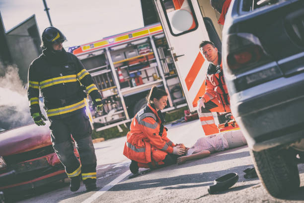 istock Paramedics with car accident victim 824941302