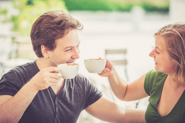 Couple drinking italian cappuccino