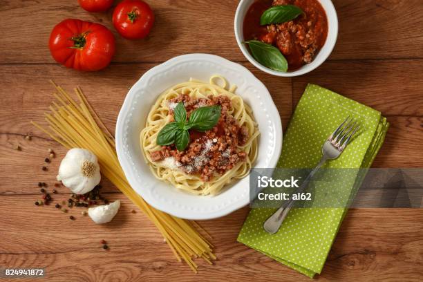 Spaghetti With Meat Sauce With Ingredients Around Stock Photo - Download Image Now - Basil, Bolognese Sauce, Carbohydrate - Food Type