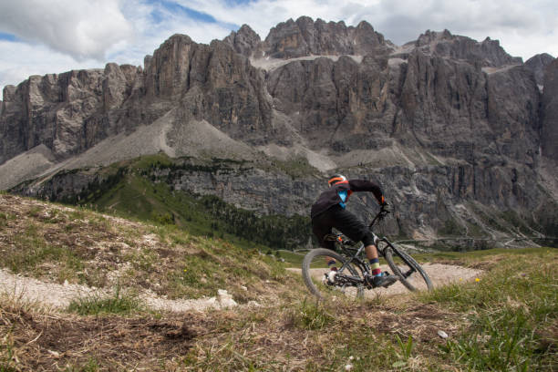 istock Riding mountainbike in the Alps 824941900