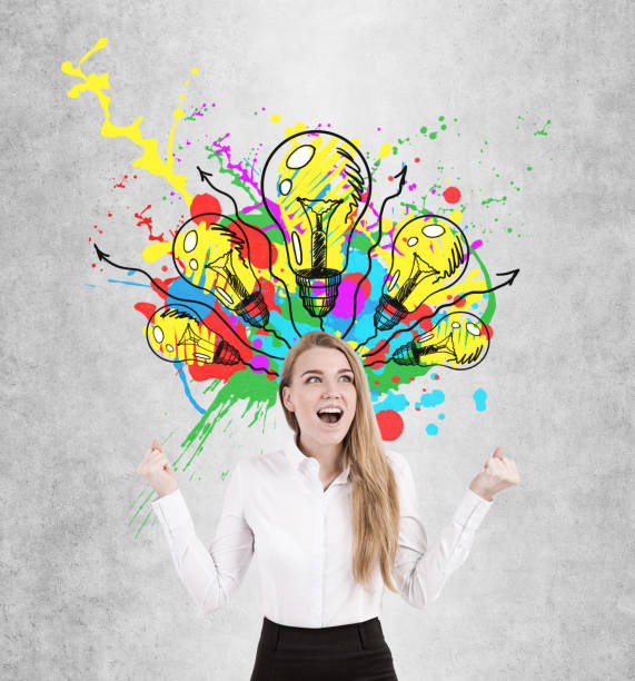 istock Happy blond woman screaming, light bulbs 824946336