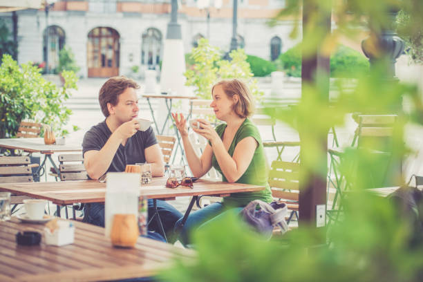 istock Couple drinking italian cappuccino 824952832