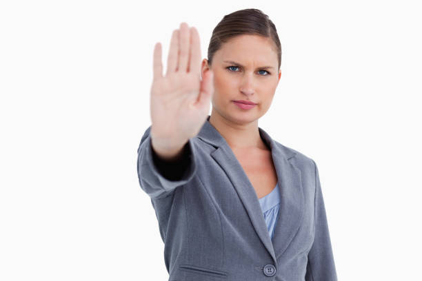 istock Tradeswoman signalizing stop 824955908