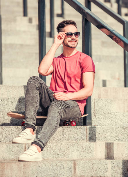 istock Stylish guy outdoors 824966816