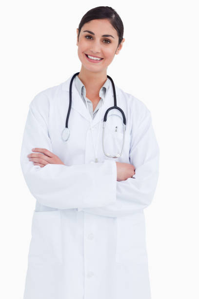 istock Smiling female doctor with arms folded 824970614