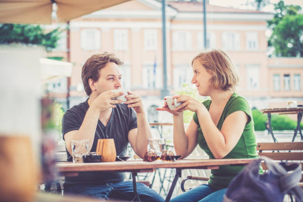 istock Couple drinking italian cappuccino 824970748