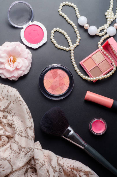 istock Make up cosmetics with brush on black backaground 824971838