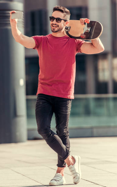 istock Stylish guy outdoors 824974386