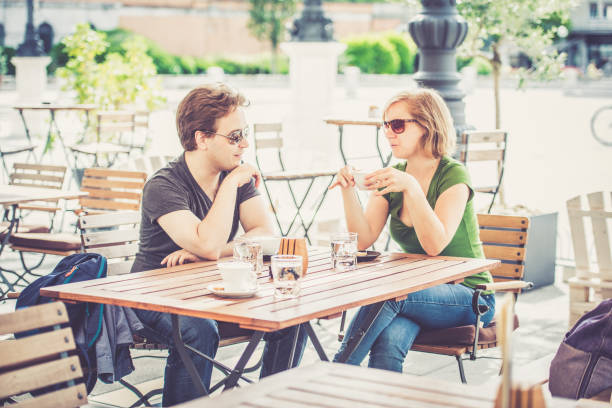 istock Couple drinking italian cappuccino 824977246