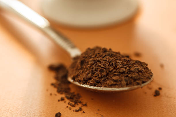 istock spoonful of chocolate powder 824980410