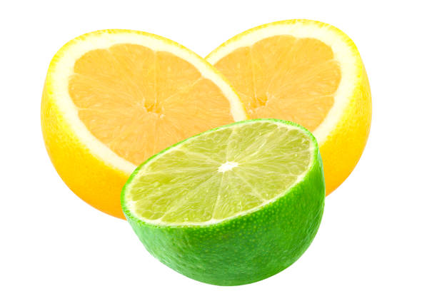 Isolated lemon and lime. Cut lemon fruit and lime isolated on white background with clipping path