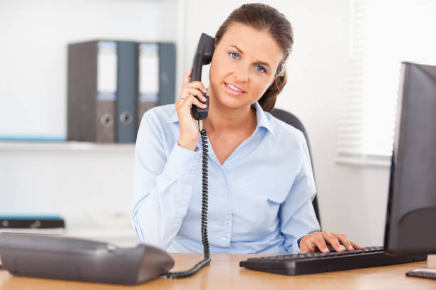 istock Telephoning businesswoman in office 824995312