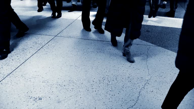 Silhouettes of Pedestrians Commuting in City.