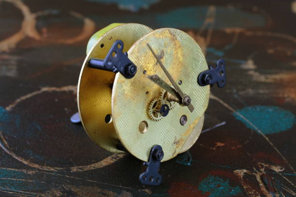istock Old clock mechanism on a dirty background. 825002228