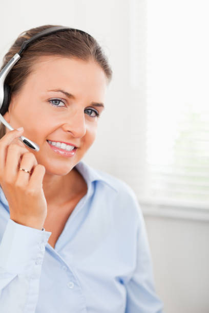 istock Woman wearing headphones looking into the camera 825004766