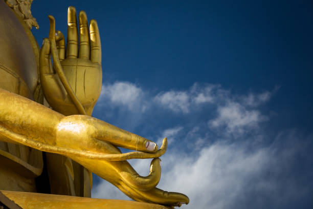 istock Hands of a Giant Buddha statue 825005858