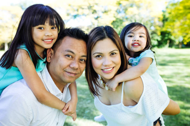 istock Happy family of four 825011638