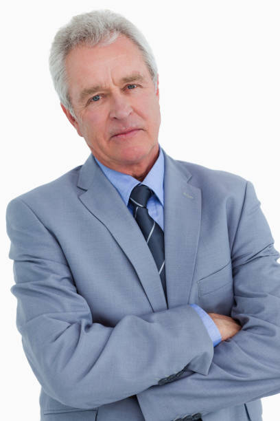 istock Mature tradesman with his arms folded 825011650