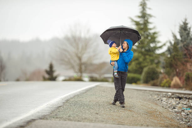 istock Family Walk in the Rain 825011874