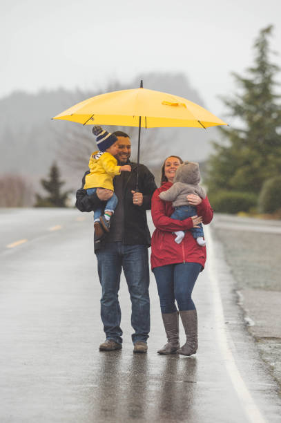 istock Family Walk in the Rain 825011892