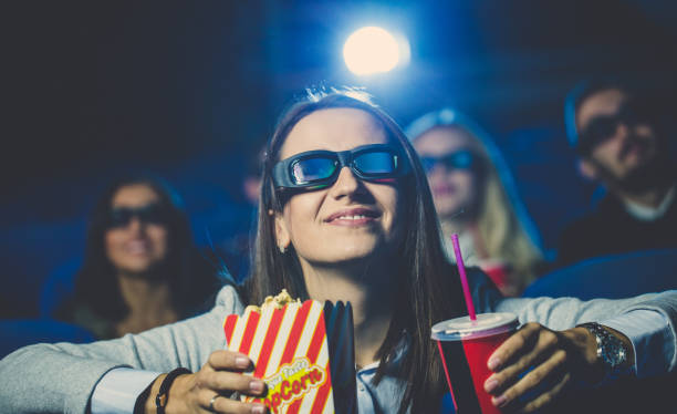 istock Young woman watching movies 825014352