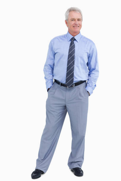 istock Smiling mature tradesman with his hands in his pockets 825019436