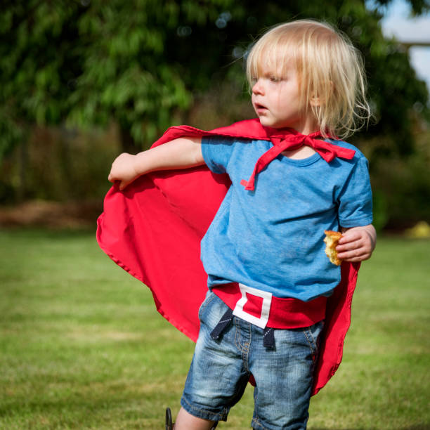 istock Superhero Little Boy Imagination Freedom Happiness Concept 825022648