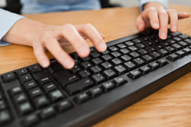 istock Woman typing on keyboard 825023520