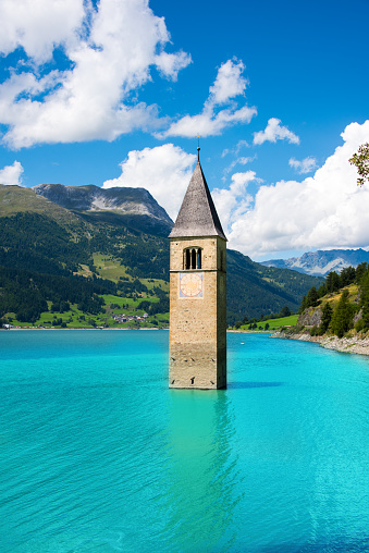 Church Tower Of Graun in the Lago Di Resia, Italy