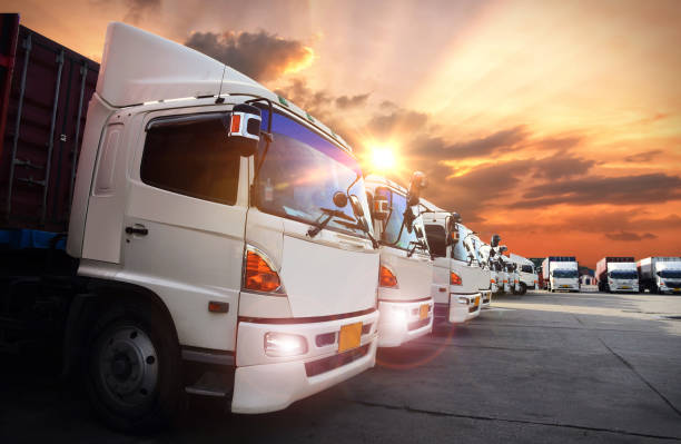 istock container truck in ship port, logistic import export and transport industry background 825026448