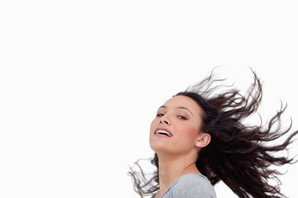 istock Young woman with her hair in motion 825034714