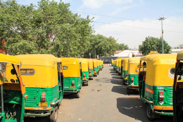 istock Pile of Auto Rickshaws waiting to take passengers. 825038012