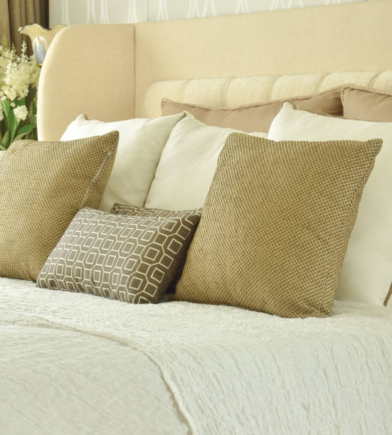 istock classic style bedding with brown and yellow tone decoration 825042340
