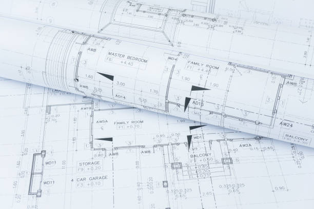 istock architectural drawing paper rolls of a dwelling for construction 825042842