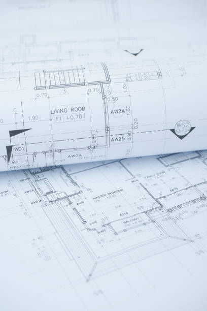 istock architectural drawing paper rolls of a dwelling for construction 825046210