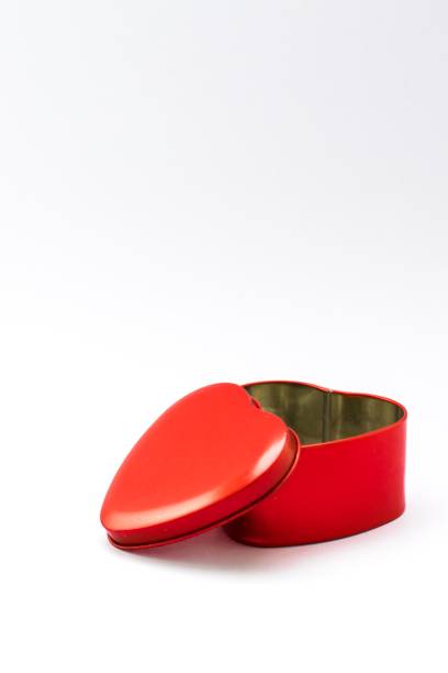 istock Red box heart shape on a white background. Using wallpaper or background for package and product work image. 825046306