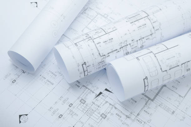 istock architectural drawing paper rolls of a dwelling for construction 825046926