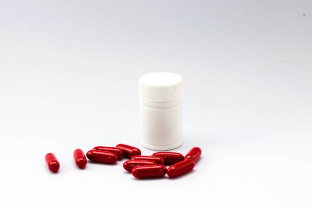 istock plastic bottle white and drug on the white background. Using wallpaper for package work photo and isolated image. 825055918