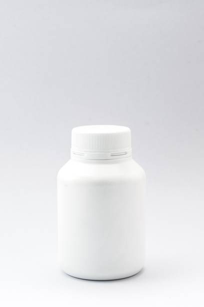 istock plastic bottle white and drug on the white background. Using wallpaper for package work photo and isolated image. 825055942