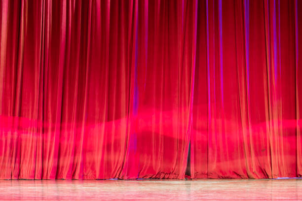 istock Red curtain and motion in the theatre. 825058626