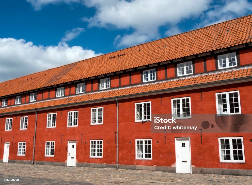 Part of The Rows in Kastellet, Copenhagen Part of The Rows in Kastellet (the Citadel) a star shaped fortress in Copenhagen, capital of Denmark. The Rows are long terraces originally built as barracks for the soldiers stationed at Kastellet. Barracks Stock Photo