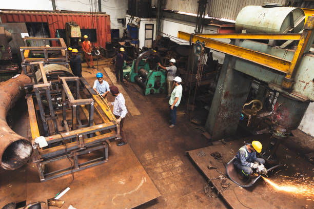 istock Heavy metal factory operating on a regular day 825060384